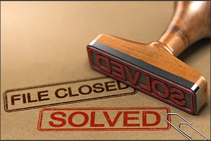 A rubber stamp with the word " closed " under it.