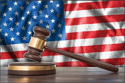 lp-6-2 A judge 's gavel in front of an american flag.