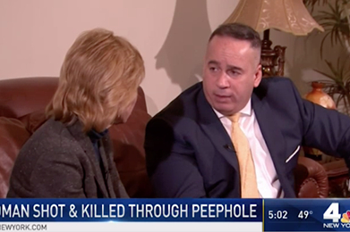 unnamed Television interview with suited man