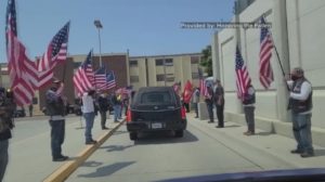 People holding American flags